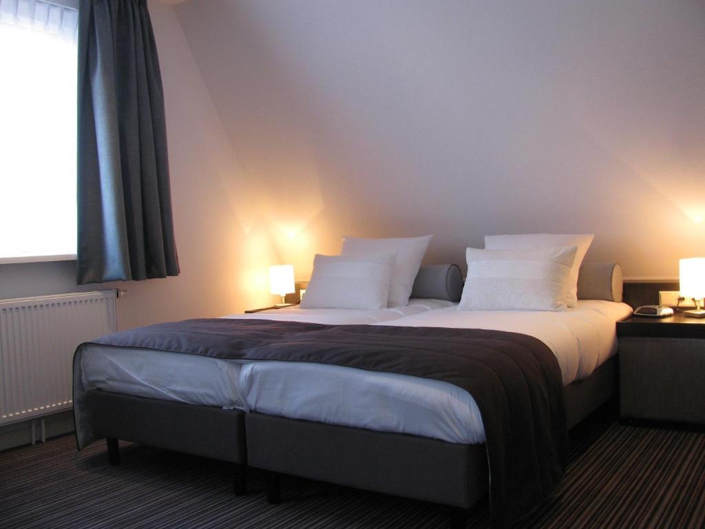 Boutique Hotel De Zwaluw De Koog  Værelse billede